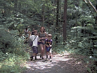 Kids walking on a trail